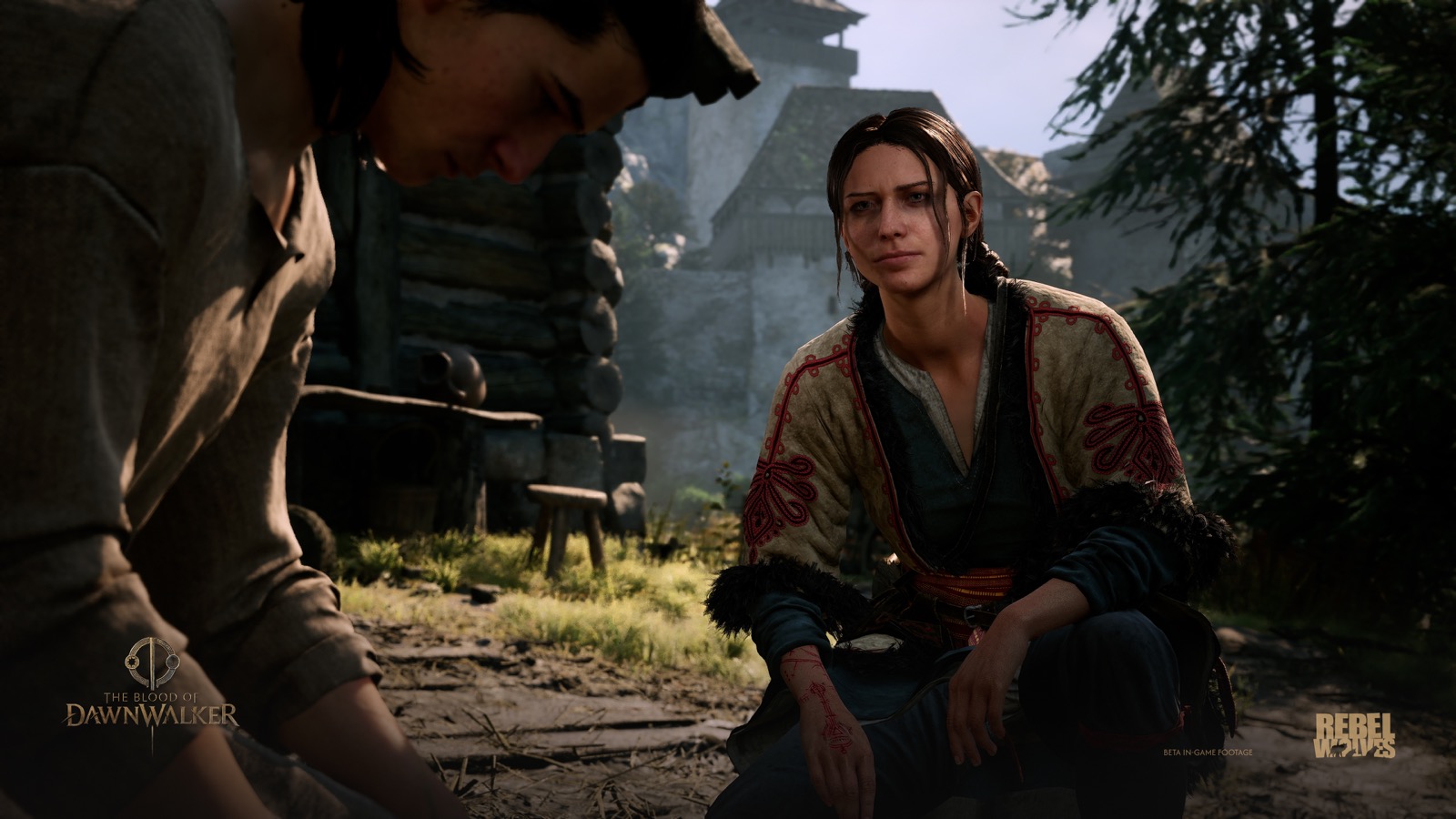 Coen y una mujer conversan en una aldea de Vale Sangora en The Blood of Dawnwalker