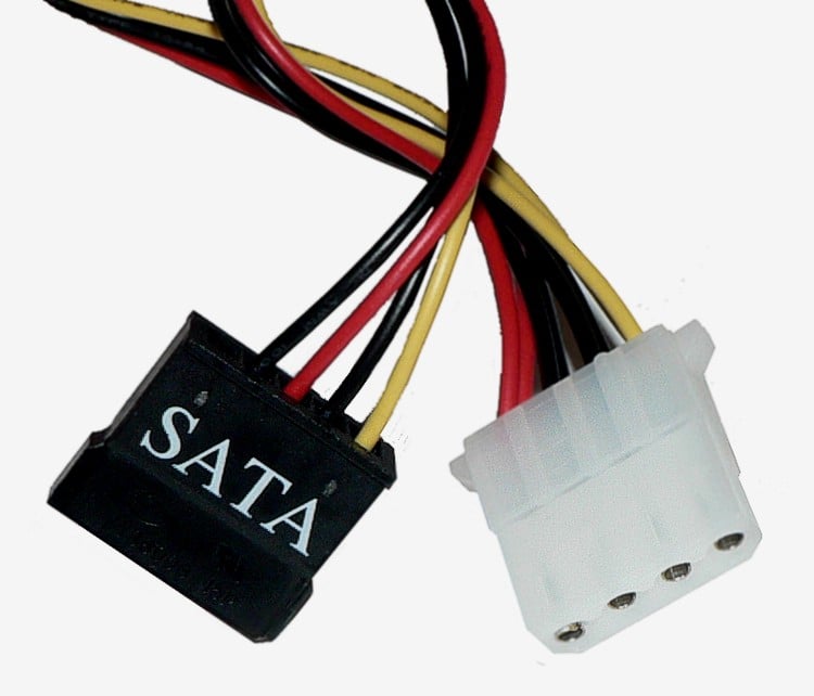 Component-side SATA and four-pin peripheral power plugs, not modular PSU-side connectors
