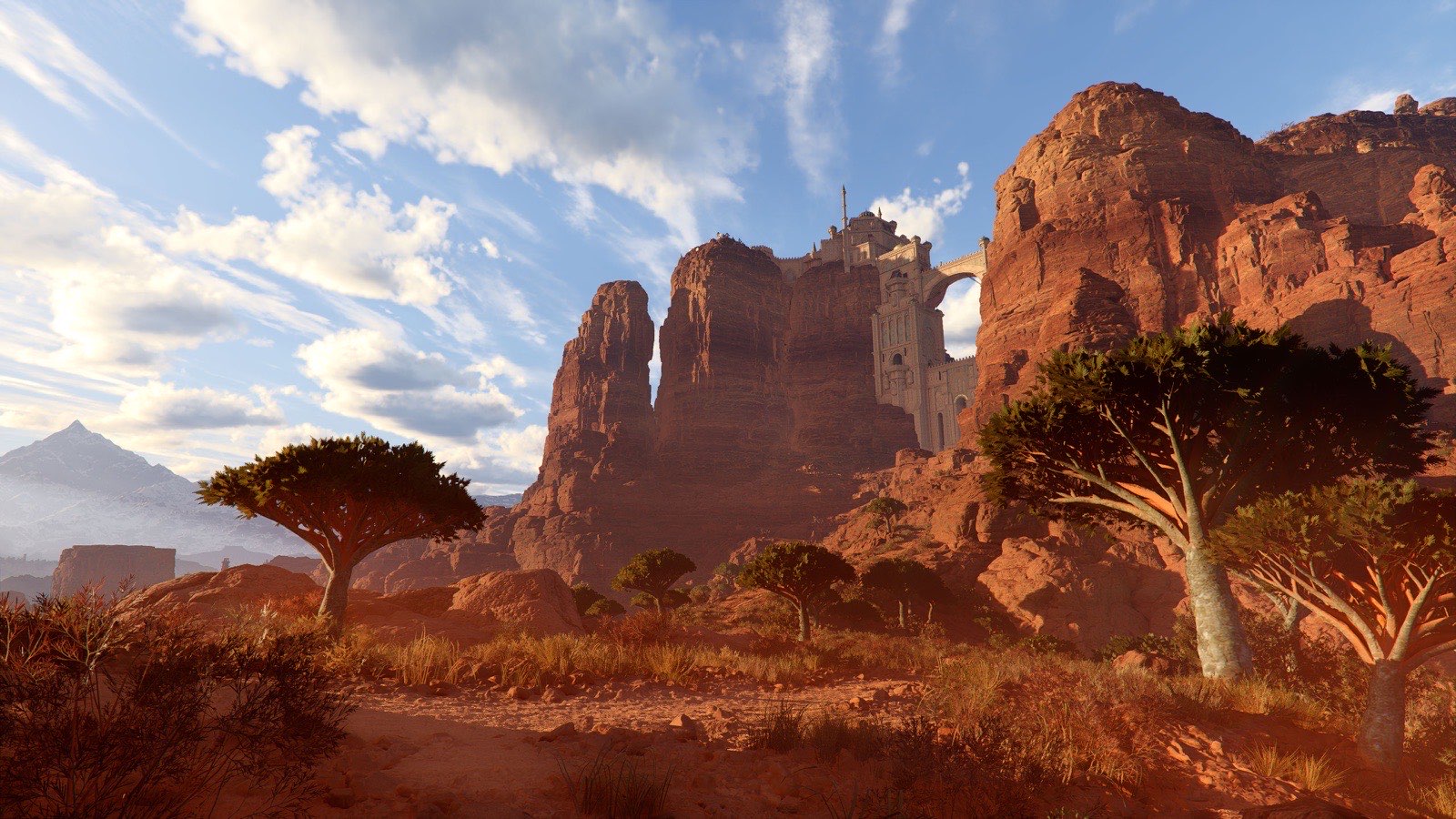 The desert region of Pywel in Crimson Desert Enhanced, with a fortress built into the cliffs