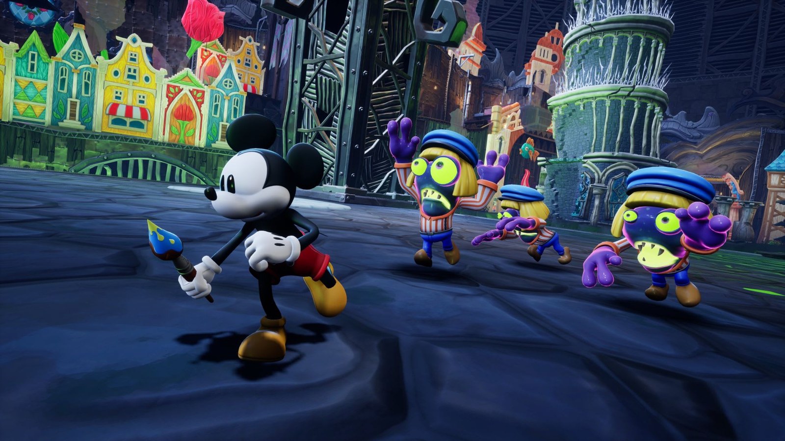 Mickey usa su pincel cerca de enemigos en una captura oficial