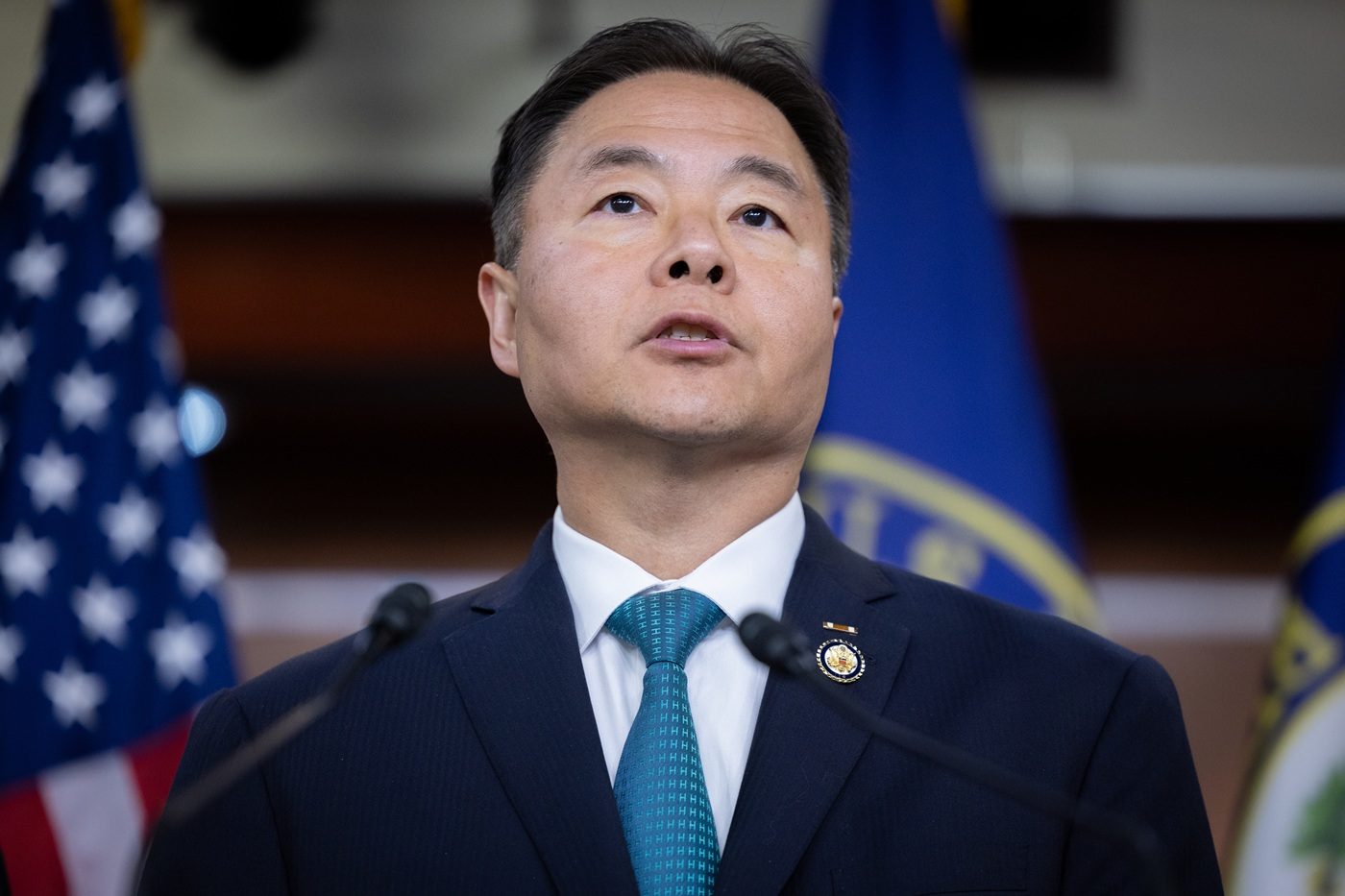 Congressman Ted Lieu speaks at microphones on Capitol Hill