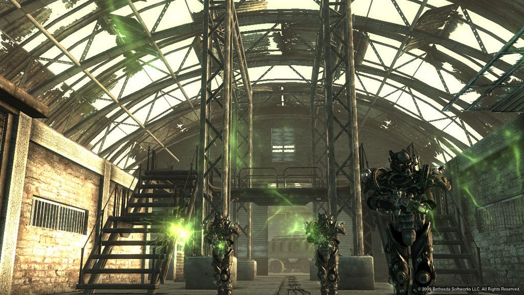 Three Enclave soldiers in power armor advance through a hangar in an official screenshot from the original Fallout 3