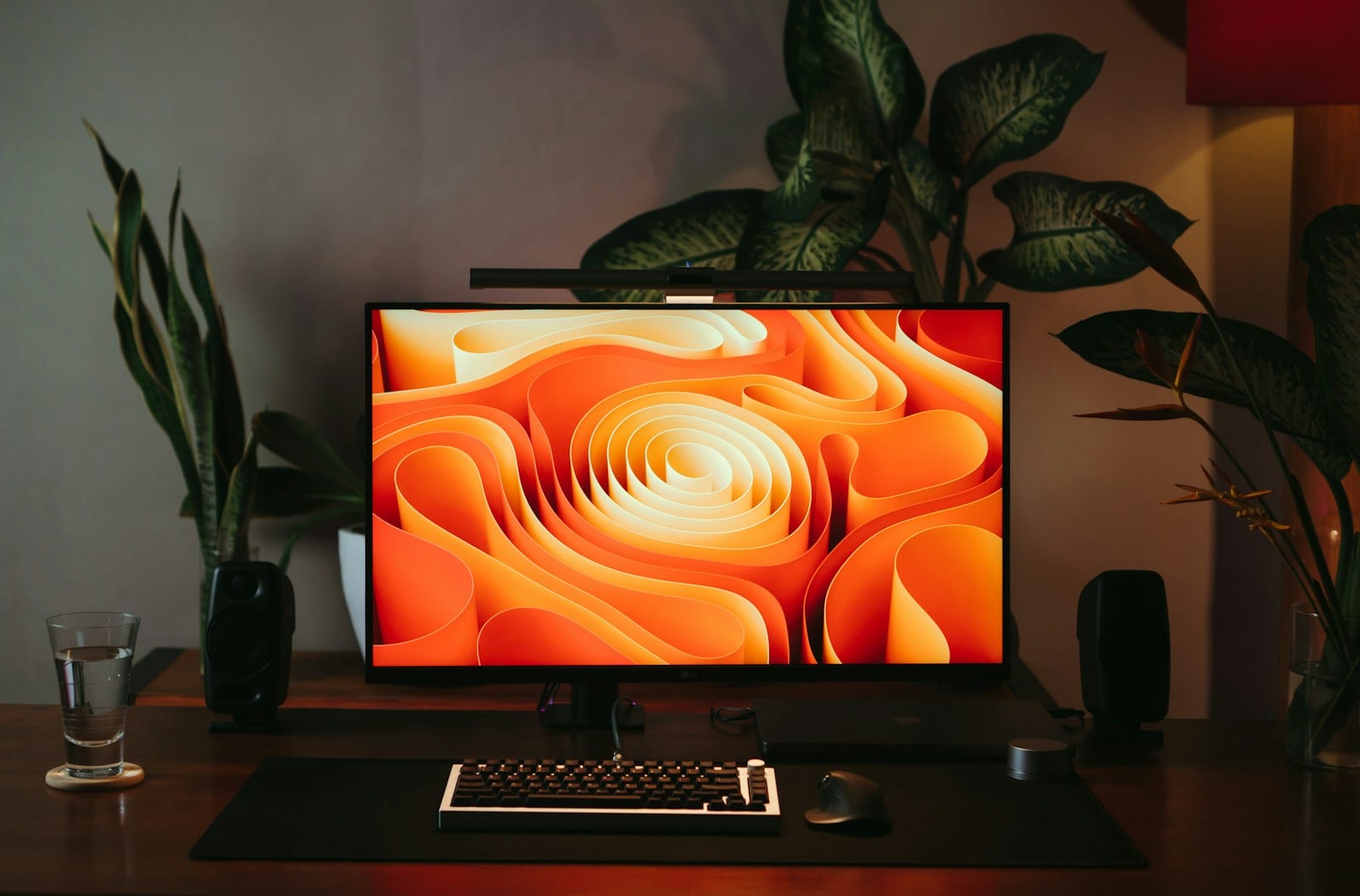 Desk with a monitor and computer used for gaming