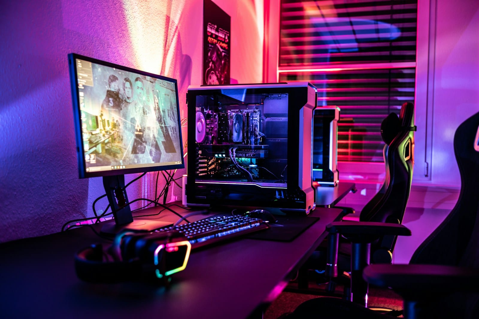 Gaming PC with a monitor, keyboard and illuminated components