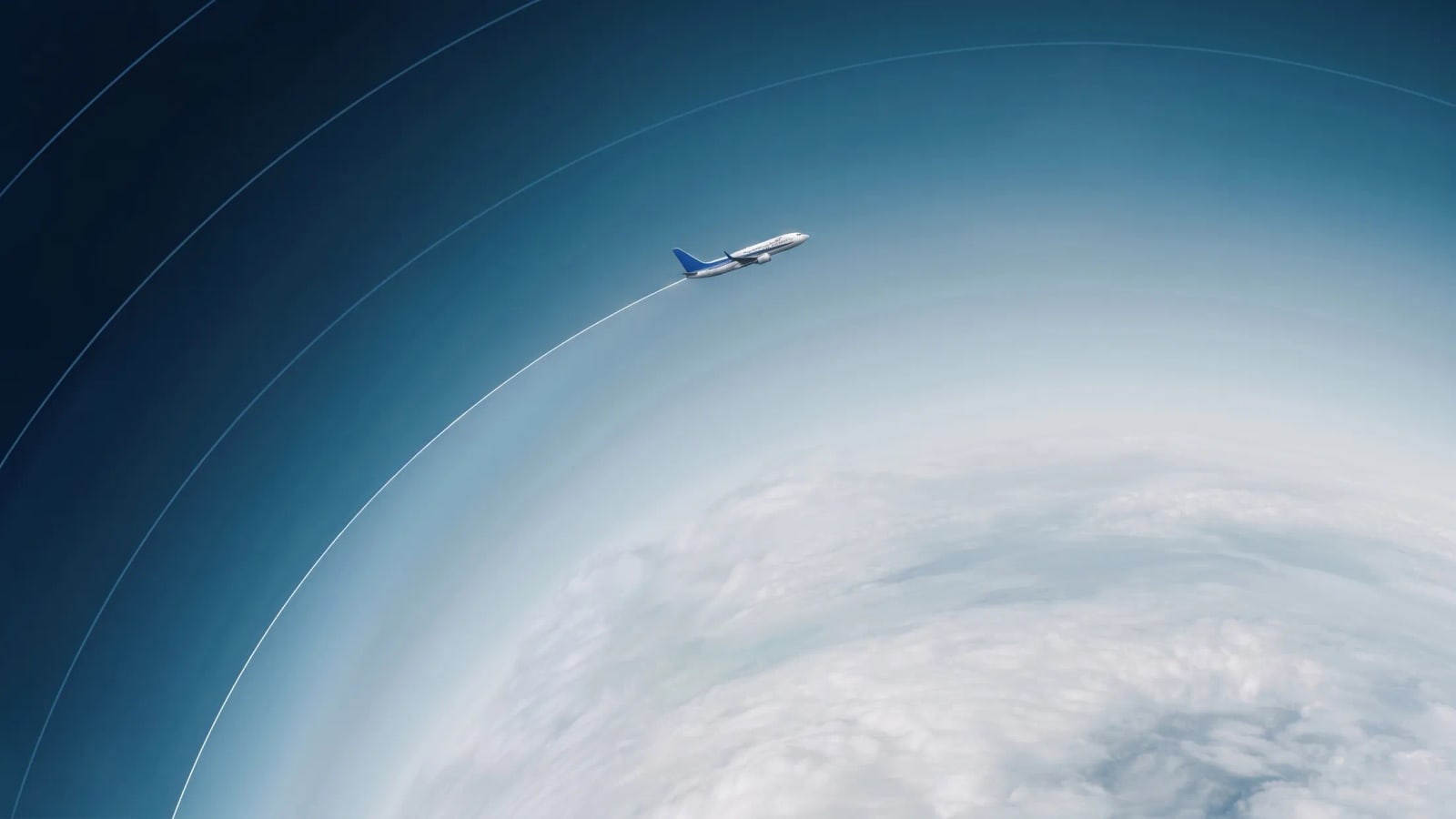 Commercial aircraft following a route above a cloud system