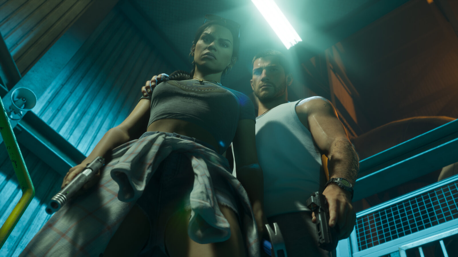Lucia y Jason, pistola en mano, en una escalera en una captura oficial de GTA VI