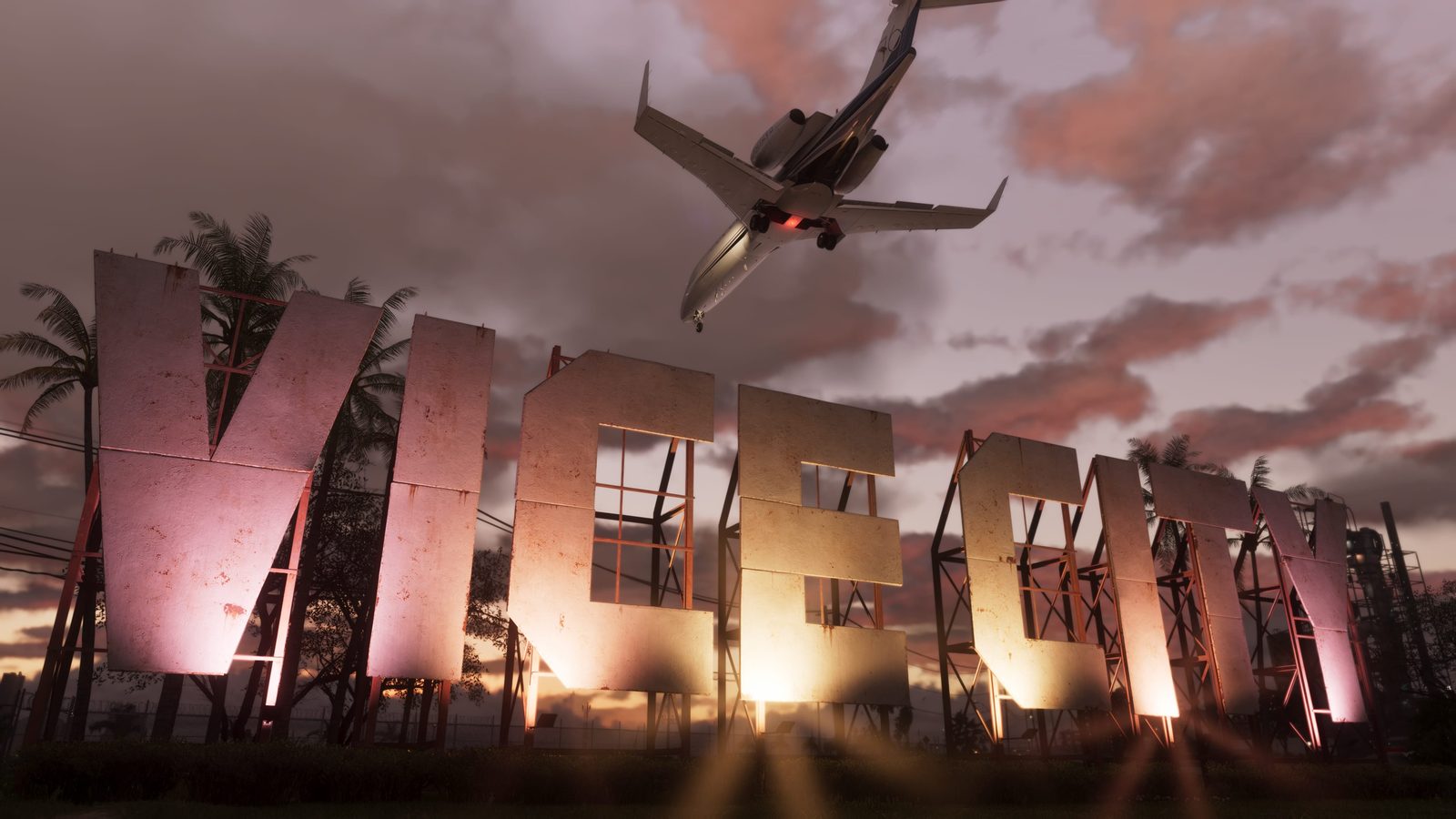 Un avión sobrevuela el gran cartel de Vice City al atardecer en una captura oficial de Grand Theft Auto VI