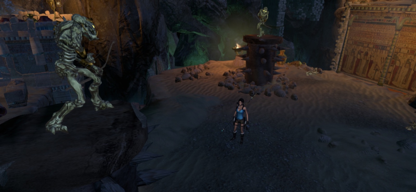 Lara explora un templo egipcio rodeado de esqueletos y mecanismos