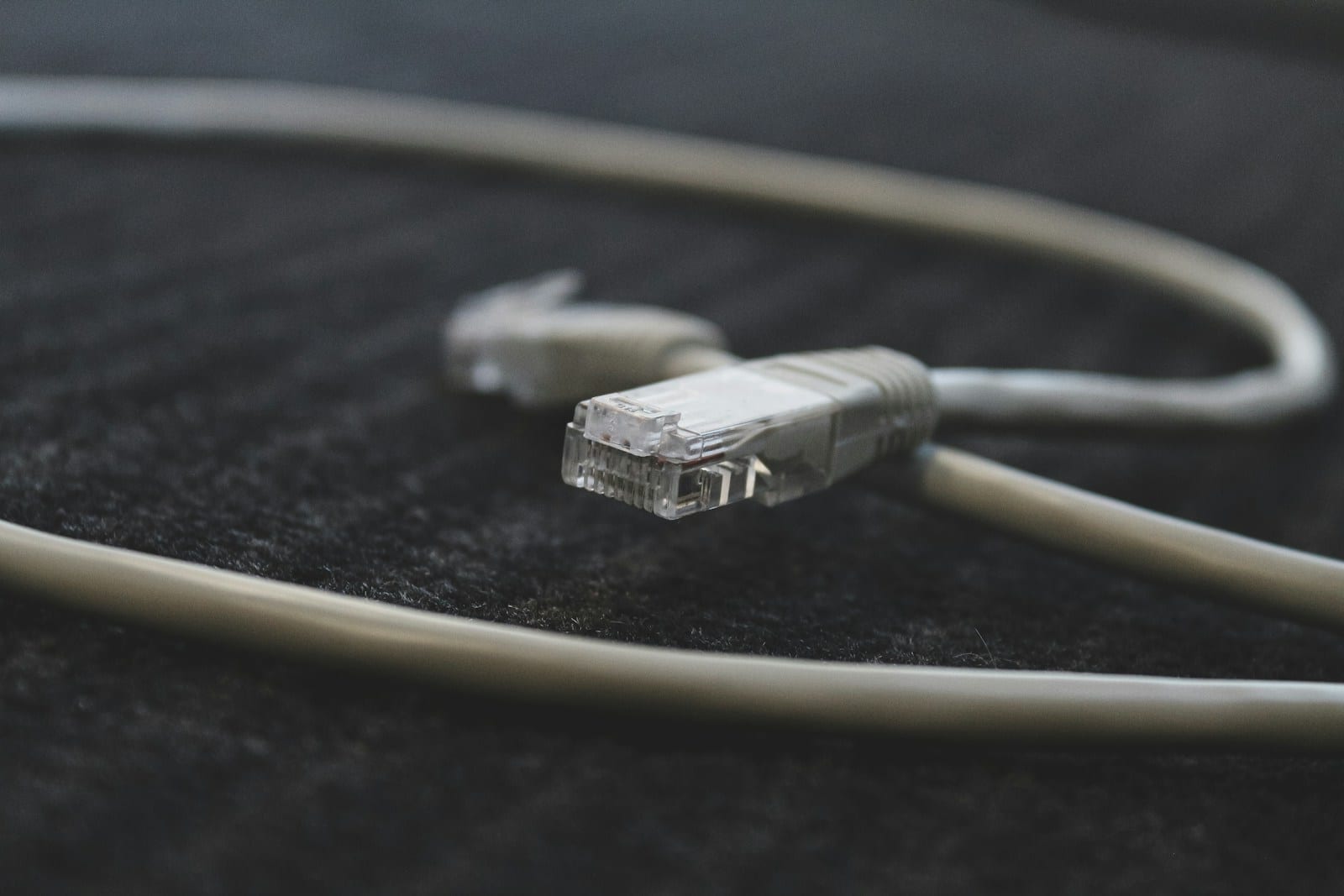 Memory module beside a network cable on a desk