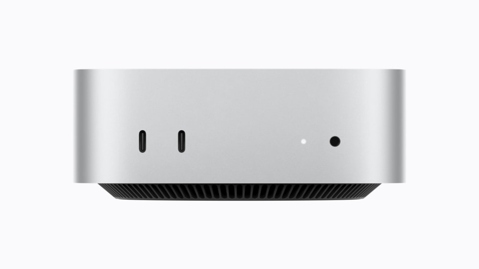 Front of the M6 Mac mini with two USB-C ports and a headphone jack