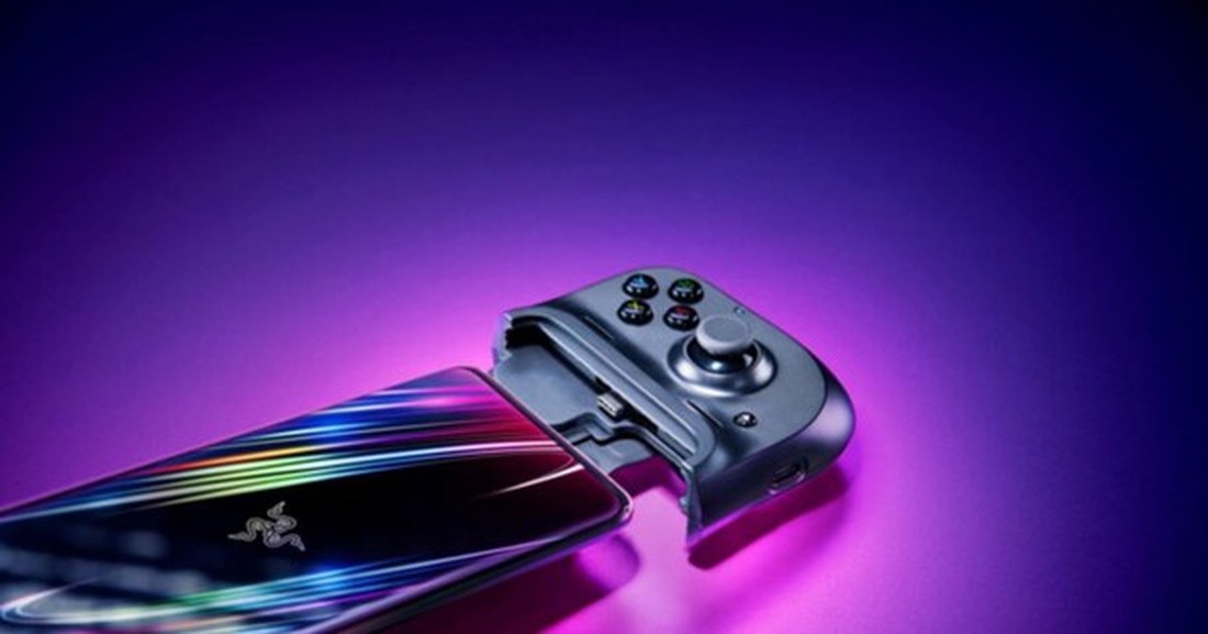 A phone with a Razer Kishi-style controller attached, ready to play