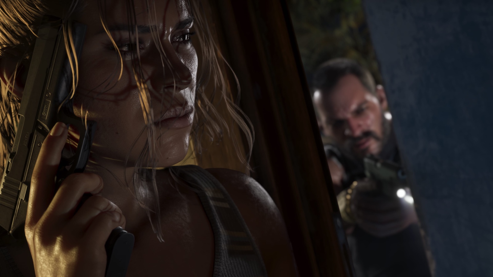 Lucia Caminos hides with a pistol while a man searches for her in an official GTA 6 image