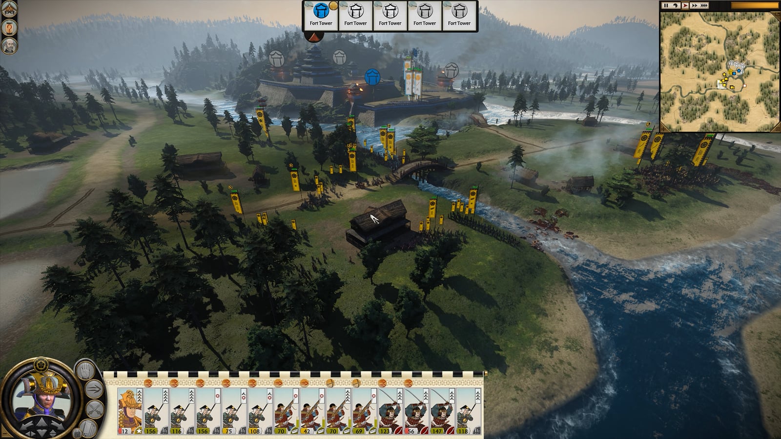 An army approaching a riverside fortress, with unit cards and the minimap visible