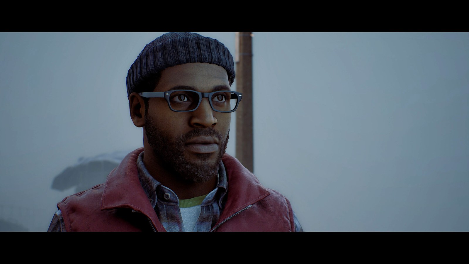 Un personaje con gorro de lana y gafas en Silent Hill: Townfall