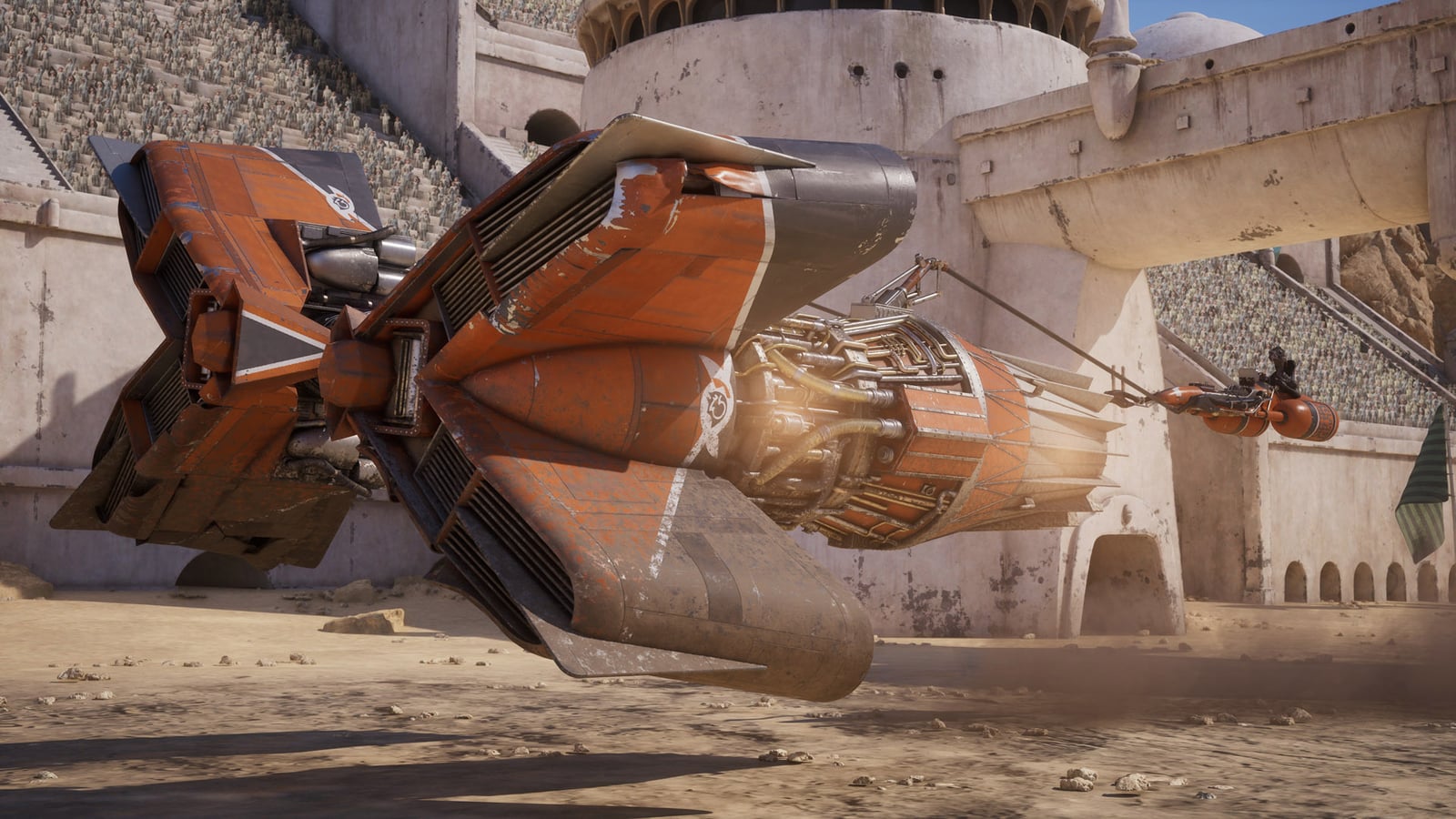 Sebulba’s orange podracer in front of the stands at a Galactic Racer circuit