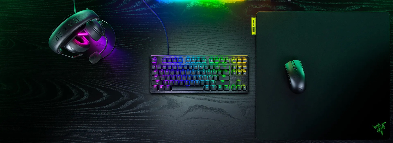 Razer Huntsman V3 HE Magnetic 8KHz TKL beside a mouse and gaming headset
